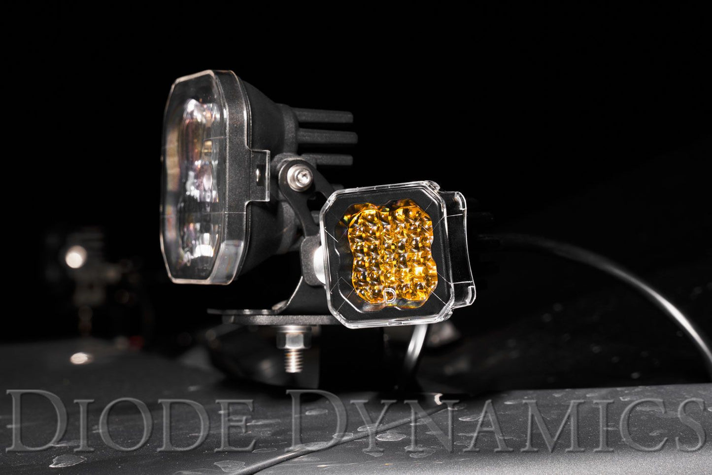 SSC1 LED Pod Cover, Yellow -Motorcycle lights with Diode Dynamics branding on a dark background