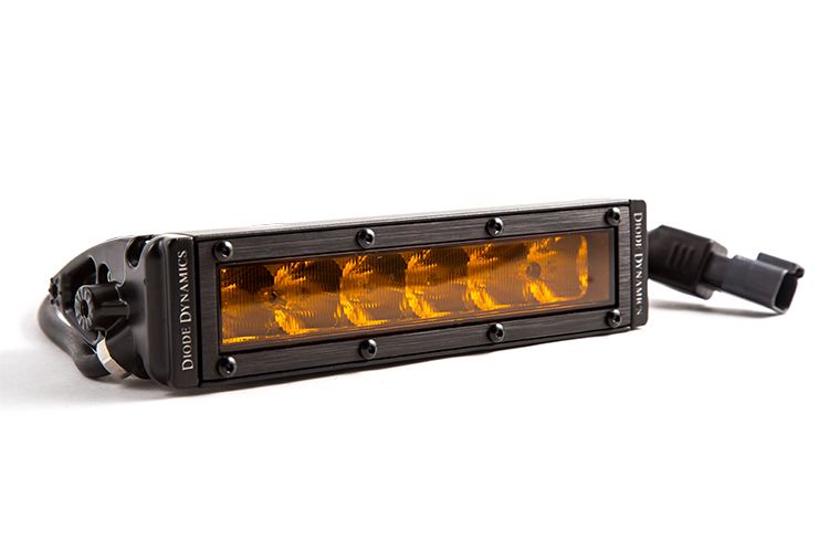 LED light bar with amber lenses on a white background