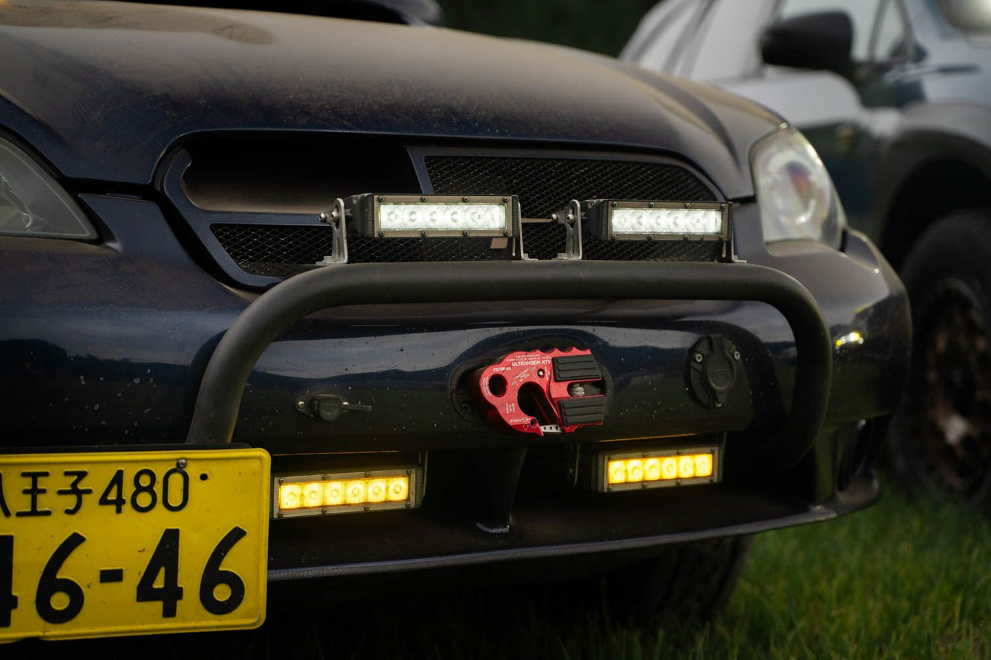 Close-up of LED headlights on a modified car with premium automotive lighting in India